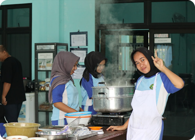 People preparing food in kitchen
